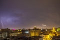 Lightning storm over city in purple light in jeddah al marwah Royalty Free Stock Photo