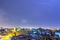 Lightning storm over city in purple light in jeddah al marwah Royalty Free Stock Photo