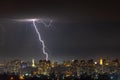 Lightning storm over the city at the summer heavy rain. Dramatic, breathtaking atmospheric natural phenomenon. Kyiv, Ukraine Royalty Free Stock Photo