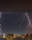 Lightning storm over the city at the summer heavy rain. Dramatic, breathtaking atmospheric natural phenomenon. Kyiv, Ukraine Royalty Free Stock Photo