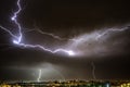 Lightning storm over the city at the summer heavy rain. Dramatic, breathtaking atmospheric natural phenomenon. Kyiv, Ukraine Royalty Free Stock Photo