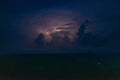 Lightning storm over dark mountain landscape Royalty Free Stock Photo