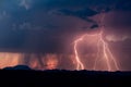 Lightning storm at sunset in the Arizona desert Royalty Free Stock Photo