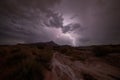 Lightning strike above Gooseberry Mesa in Southern Utah at night Royalty Free Stock Photo