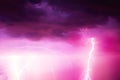 A lightning strike on the cloudy sky. Pink, lilac and purple toned image Royalty Free Stock Photo