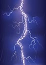 Lightning strike on dark blue sky.