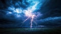Lightning strike in the dark blue sky over a field Royalty Free Stock Photo