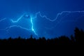 Lightning strike on a dark blue sky Royalty Free Stock Photo