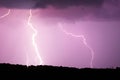 Clouds and thunder lightnings and storm on dark cloudy sky Royalty Free Stock Photo