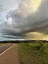 Lightning strike on the horizon during an electrical storm on the grassland Royalty Free Stock Photo