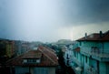 Lightning strike over dark blue sky in night city Royalty Free Stock Photo