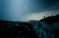 Lightning strike over dark blue sky in night city Royalty Free Stock Photo