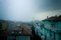 Lightning strike over dark blue sky in night city Royalty Free Stock Photo