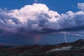 Lightning strike during a thunder storm over the desert Royalty Free Stock Photo