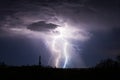 Lightning strike from a thunderstorm in the Arizona desert Royalty Free Stock Photo