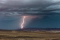 Lightning strikes the cliffs above Lake Powell in Page, Arizona. Royalty Free Stock Photo
