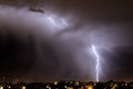 Lightning strikes at night during a severe thunderstorm over the city of Mendoza, Argentina. Royalty Free Stock Photo