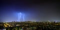 Lightning strikes in the night sky over the night town 3 Royalty Free Stock Photo