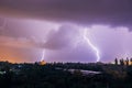 Lightning strikes during thunderstorm over the city Royalty Free Stock Photo