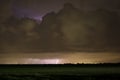 Lightning striking down from a distant thunderstorm Royalty Free Stock Photo
