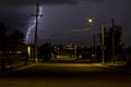 Lightning Striking in a Neighborhood of Tucson Arizona at Night Time Royalty Free Stock Photo