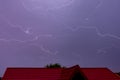 Lightnings across the sky during a storm Royalty Free Stock Photo