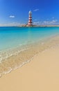 Bahamas Beach with red white Lightouse Royalty Free Stock Photo