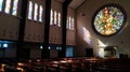 Lightplay of sun rays in the church Royalty Free Stock Photo