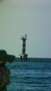 Lightpost in the sea during summer