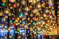 Lights against a black background in a random store create an abstract pattern- Bangkok, Thailand Royalty Free Stock Photo