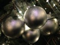 Lights and Ball Ornaments on a Christmas Tree with Rain Drops after Rain. Royalty Free Stock Photo
