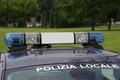 Lights on the CAR with text POLIZIA LOCALE that means Local Poli