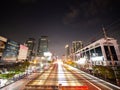 The Lights from The Cars Driving Through The Intersection at Night Royalty Free Stock Photo