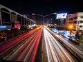 The Lights from The Cars Driving Through The Intersection at Night Royalty Free Stock Photo