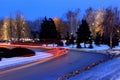 The lights of cars on the road in winter. Royalty Free Stock Photo