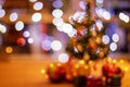 Lights and christmas tree on colorful defocused background Royalty Free Stock Photo