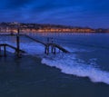 Lights of the city at dusk on the beach of La Concha in the city of San Sebastian