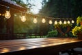 Lights dangle from the wooden porch ceiling, guiding to the garden