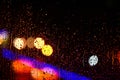 Lights of garland blurred on black background. Background concept.Lights of street or colorful garland defocused as Royalty Free Stock Photo