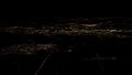 Lights of roads Amsterdam city top view from airplane window at night Royalty Free Stock Photo