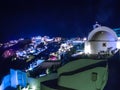 Lights of Oia village at night in Santorini Royalty Free Stock Photo