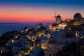 Lights of Oia village at night, Santorini, Greece. Royalty Free Stock Photo