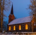 Lights on old church windows . Royalty Free Stock Photo