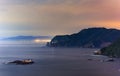 Lights on small rocky island off rugged Sea of Japan coast at night Royalty Free Stock Photo