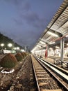 The lights at the train station at dusk