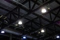 Lights and ventilation system in ceiling of the dark office industrial building Royalty Free Stock Photo