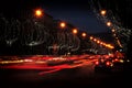 Lightstrails of vehicles in movement on the road in Florence city during Christmas season. Royalty Free Stock Photo