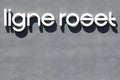 Ligne Roset logo on a wall