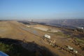 lignite brown coal surface mining . fossil fuels in germany . wind energy plants in the background . lignite opencast mine mining Royalty Free Stock Photo