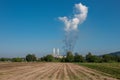 Lignite power plant for electricity generation - steam rises fro Royalty Free Stock Photo